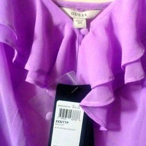 Guess elegant top in a beautiful soft lilac.